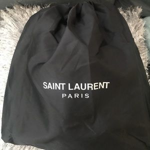 Black handbag with black chain strap